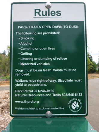 Signage with rules of the park and trail